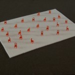"Au coeur du récit", 2001 Tissu, sucres en morceaux, carton peint (24 éléments) 2,15 x 1,50 x 0,06 m